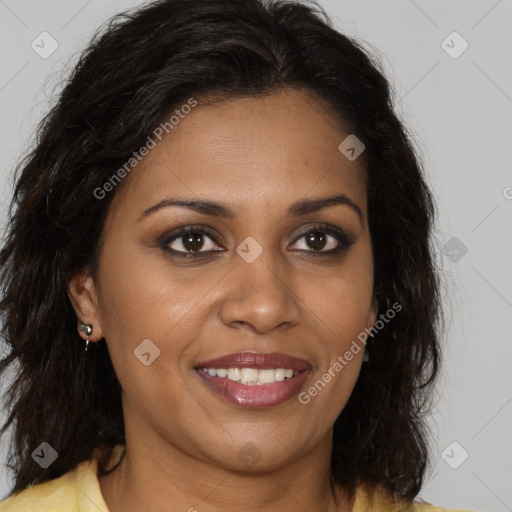 Joyful black young-adult female with medium  brown hair and brown eyes