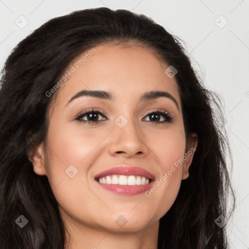 Joyful latino young-adult female with long  brown hair and brown eyes