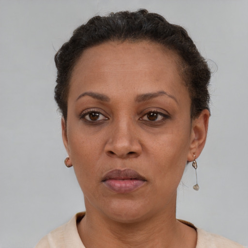 Neutral black adult female with short  brown hair and brown eyes