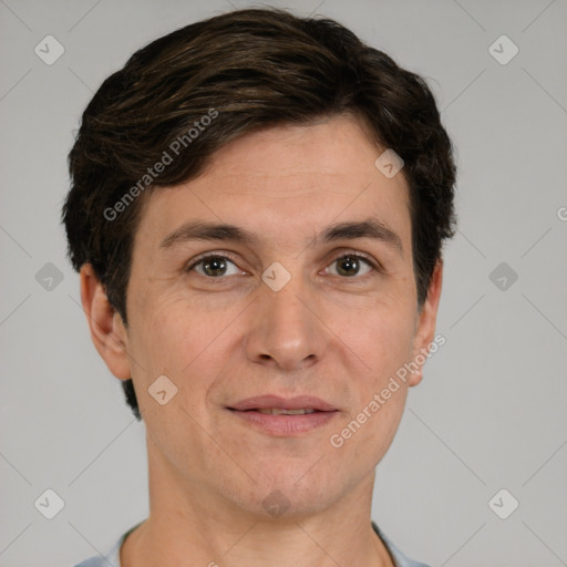 Joyful white adult male with short  brown hair and grey eyes