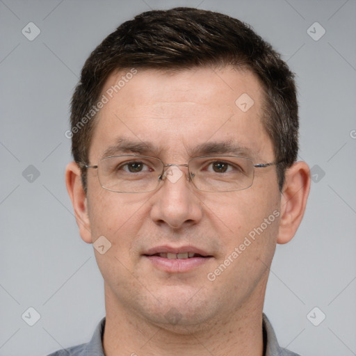 Joyful white adult male with short  brown hair and grey eyes