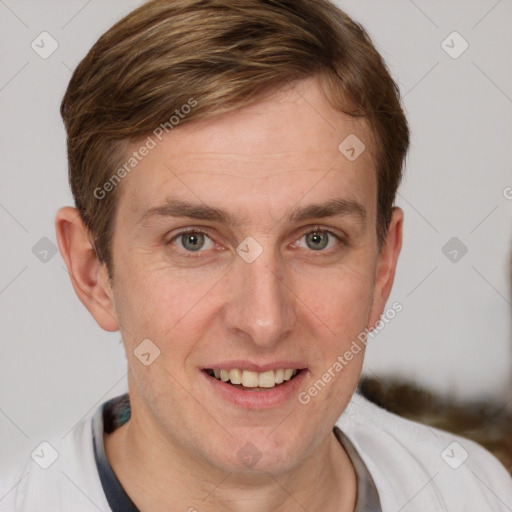 Joyful white adult male with short  brown hair and grey eyes