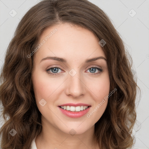 Joyful white young-adult female with long  brown hair and green eyes