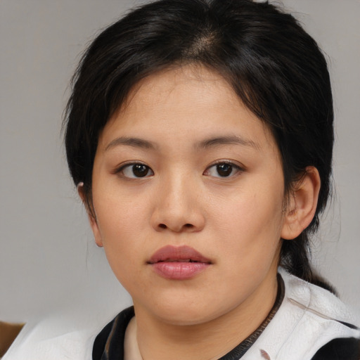 Neutral asian young-adult female with medium  brown hair and brown eyes