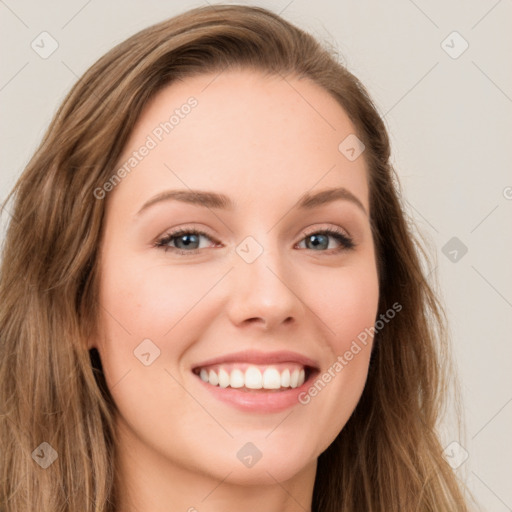 Joyful white young-adult female with long  brown hair and green eyes