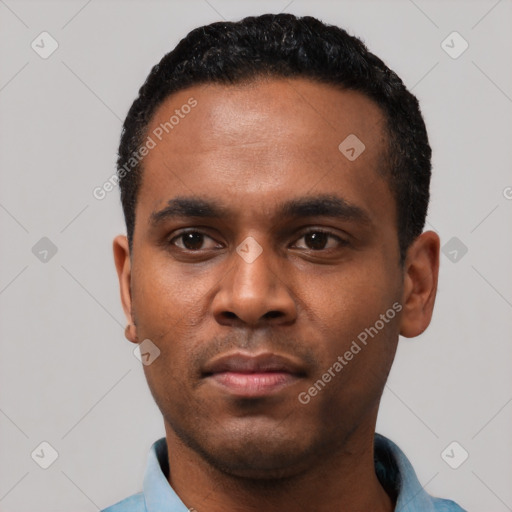 Neutral latino young-adult male with short  black hair and brown eyes