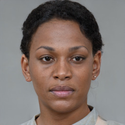 Neutral black young-adult female with short  brown hair and brown eyes