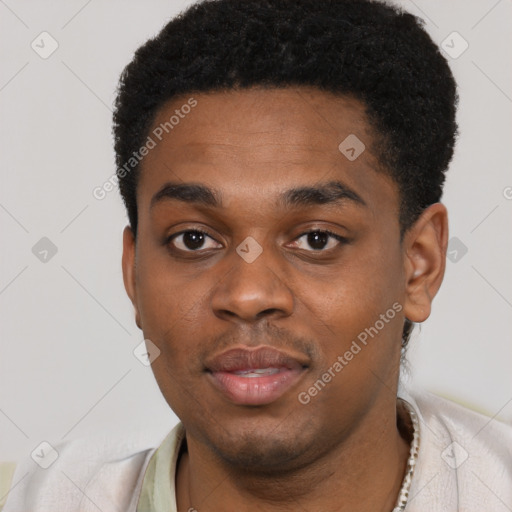 Neutral black young-adult male with short  black hair and brown eyes