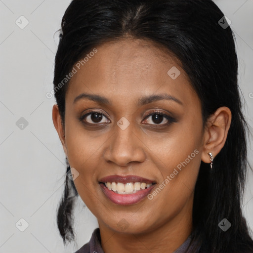 Joyful asian young-adult female with long  brown hair and brown eyes