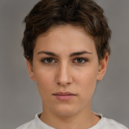 Neutral white young-adult female with short  brown hair and brown eyes