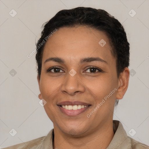 Joyful latino young-adult female with short  brown hair and brown eyes