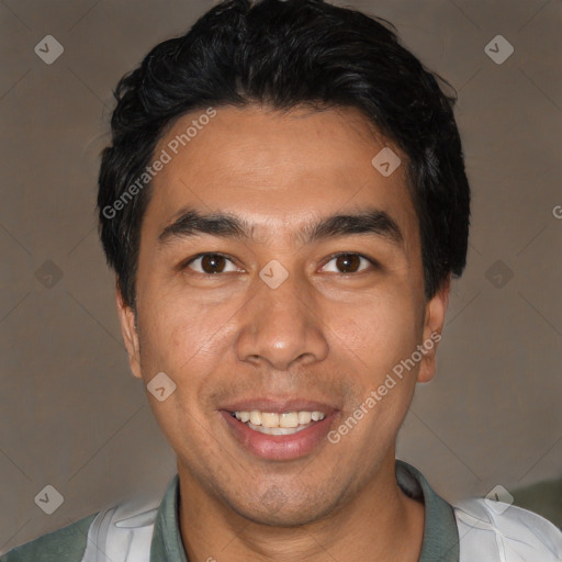 Joyful white young-adult male with short  black hair and brown eyes