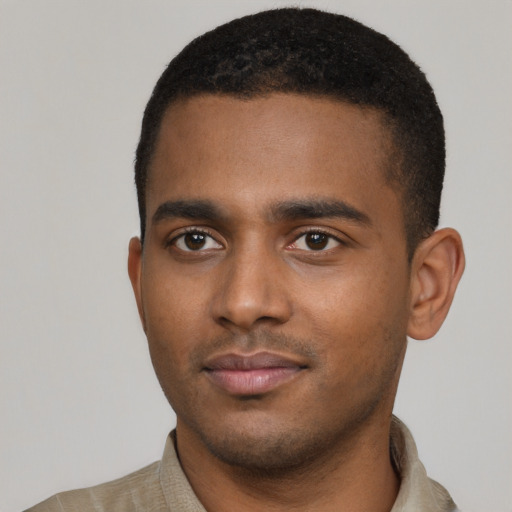 Neutral black young-adult male with short  black hair and brown eyes