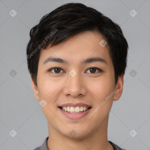 Joyful asian young-adult male with short  brown hair and brown eyes