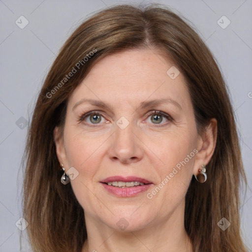 Joyful white adult female with medium  brown hair and grey eyes