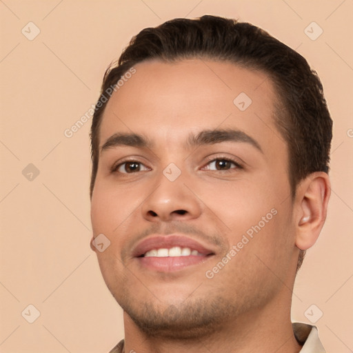 Joyful white young-adult male with short  brown hair and brown eyes