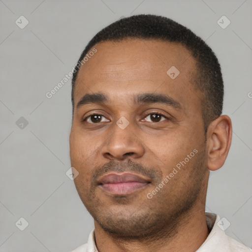 Neutral latino young-adult male with short  black hair and brown eyes