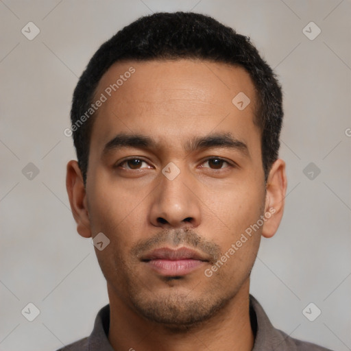 Neutral latino young-adult male with short  black hair and brown eyes