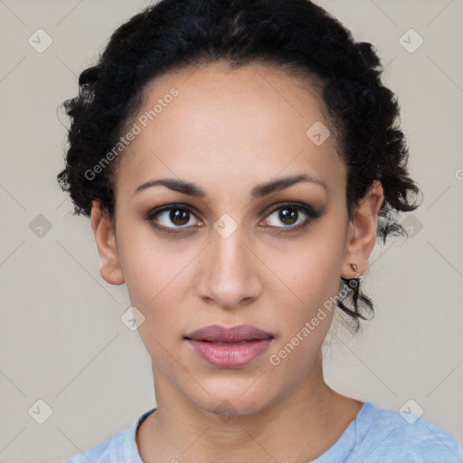 Joyful latino young-adult female with short  black hair and brown eyes