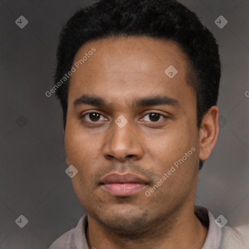 Neutral latino young-adult male with short  black hair and brown eyes