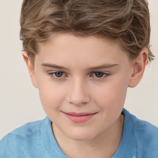 Joyful white child male with short  brown hair and brown eyes