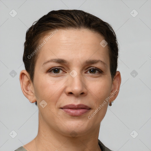 Joyful white adult female with short  brown hair and brown eyes