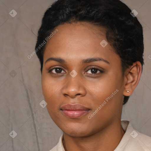 Joyful black young-adult female with short  black hair and brown eyes