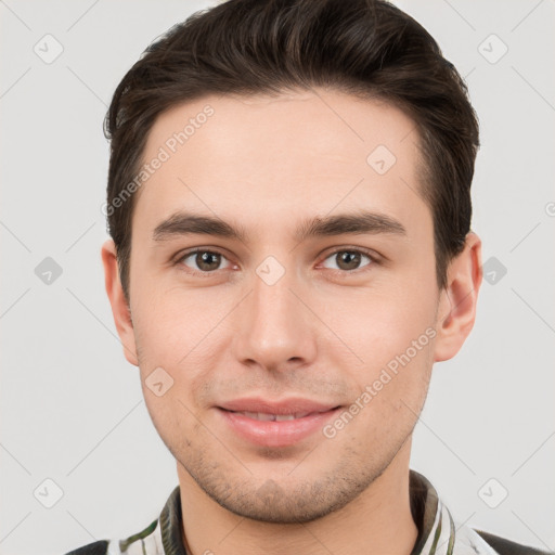 Joyful white young-adult male with short  brown hair and brown eyes