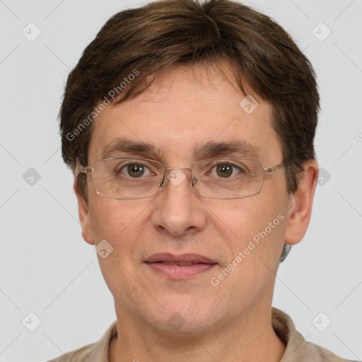 Joyful white adult male with short  brown hair and grey eyes