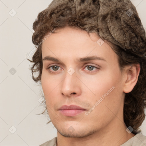 Neutral white young-adult male with medium  brown hair and brown eyes