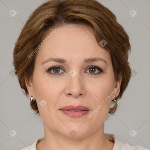 Joyful white adult female with medium  brown hair and grey eyes