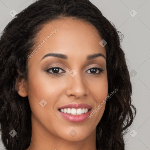 Joyful latino young-adult female with long  brown hair and brown eyes