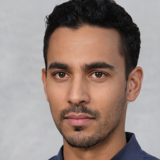 Neutral latino young-adult male with short  black hair and brown eyes