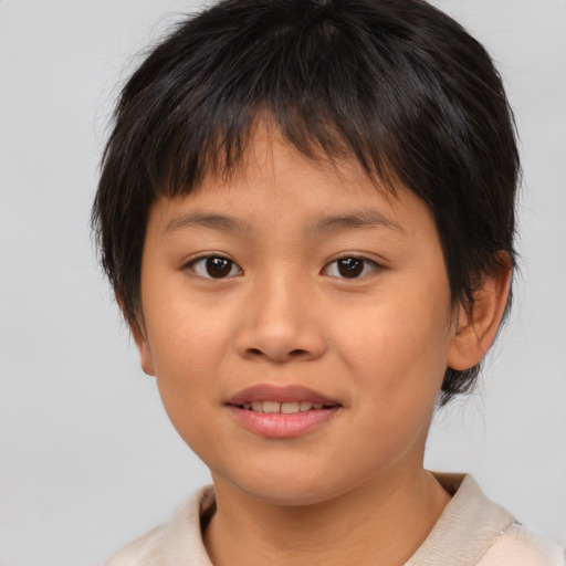 Joyful asian child female with medium  brown hair and brown eyes