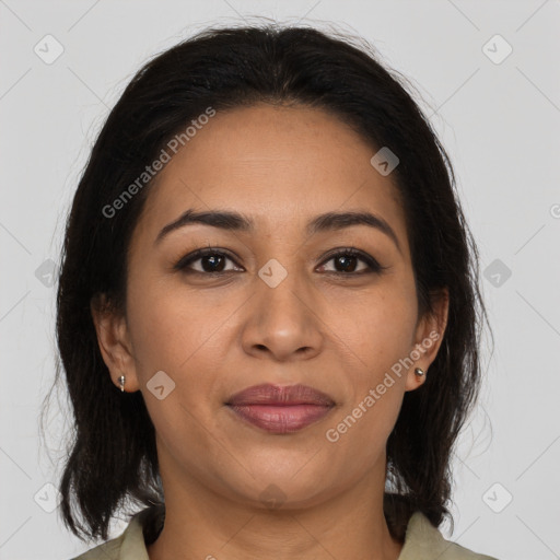 Joyful latino young-adult female with medium  brown hair and brown eyes