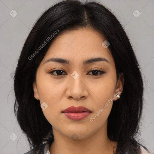 Joyful asian young-adult female with medium  black hair and brown eyes