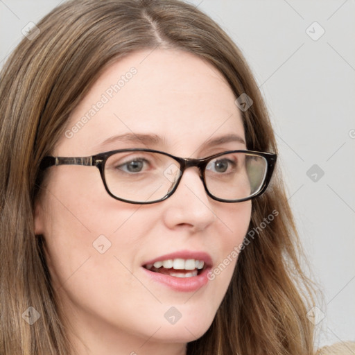 Joyful white young-adult female with long  brown hair and blue eyes