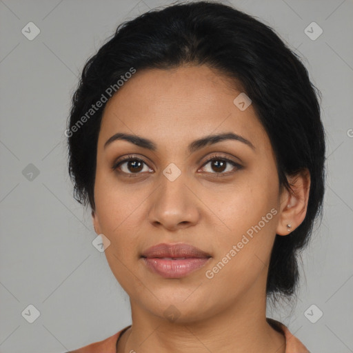 Joyful latino young-adult female with medium  black hair and brown eyes