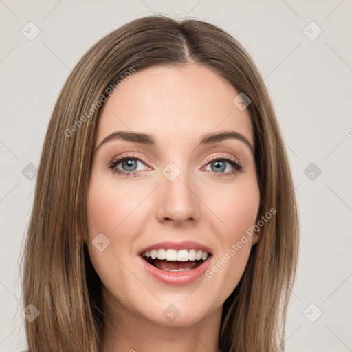 Joyful white young-adult female with long  brown hair and green eyes