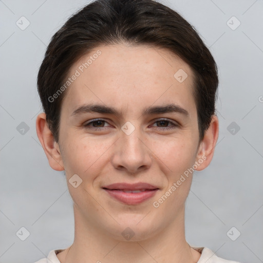 Joyful white young-adult female with short  brown hair and brown eyes