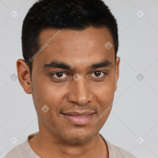 Joyful latino young-adult male with short  black hair and brown eyes