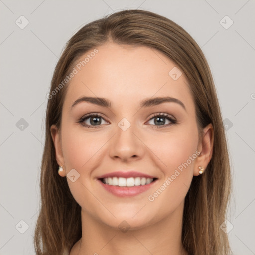 Joyful white young-adult female with long  brown hair and grey eyes