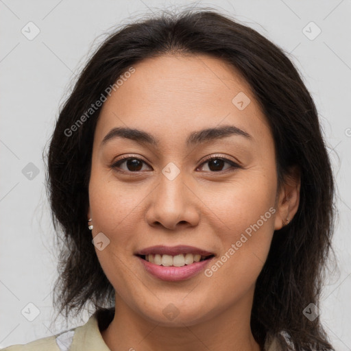 Joyful asian young-adult female with long  brown hair and brown eyes