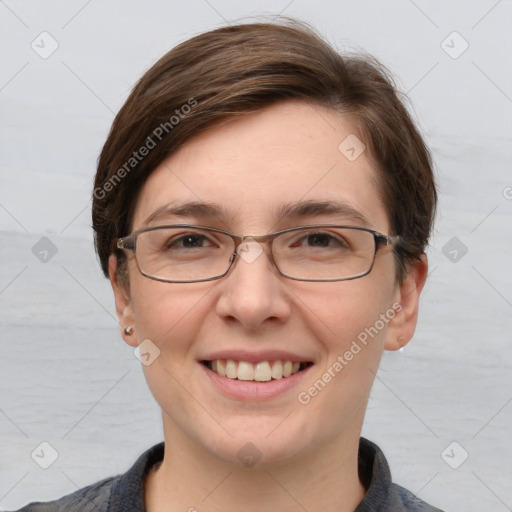 Joyful white adult female with short  brown hair and grey eyes