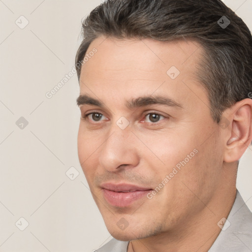 Joyful white young-adult male with short  brown hair and brown eyes