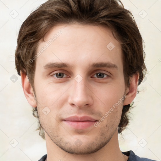 Neutral white young-adult male with short  brown hair and grey eyes