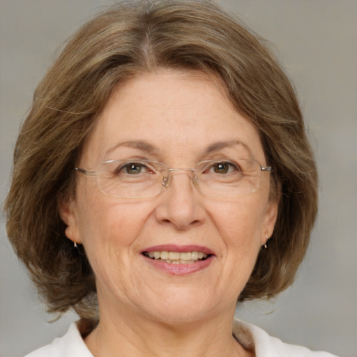 Joyful white middle-aged female with medium  brown hair and brown eyes