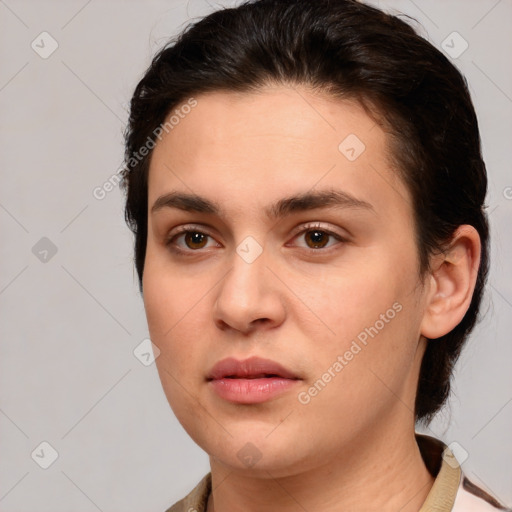 Neutral white young-adult female with medium  brown hair and brown eyes