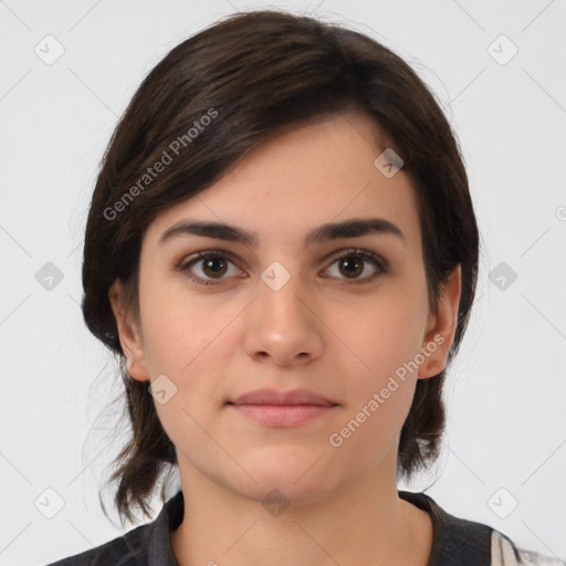 Neutral white young-adult female with medium  brown hair and brown eyes