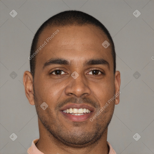 Joyful black young-adult male with short  brown hair and brown eyes